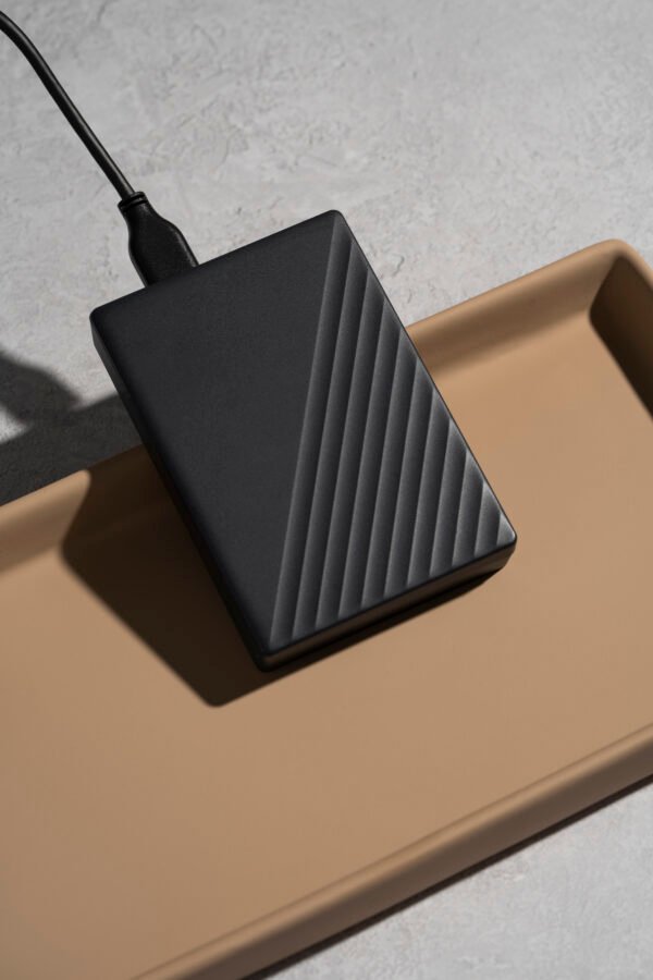 modern-wireless-charger-tray-with-concrete-background Storage Drives